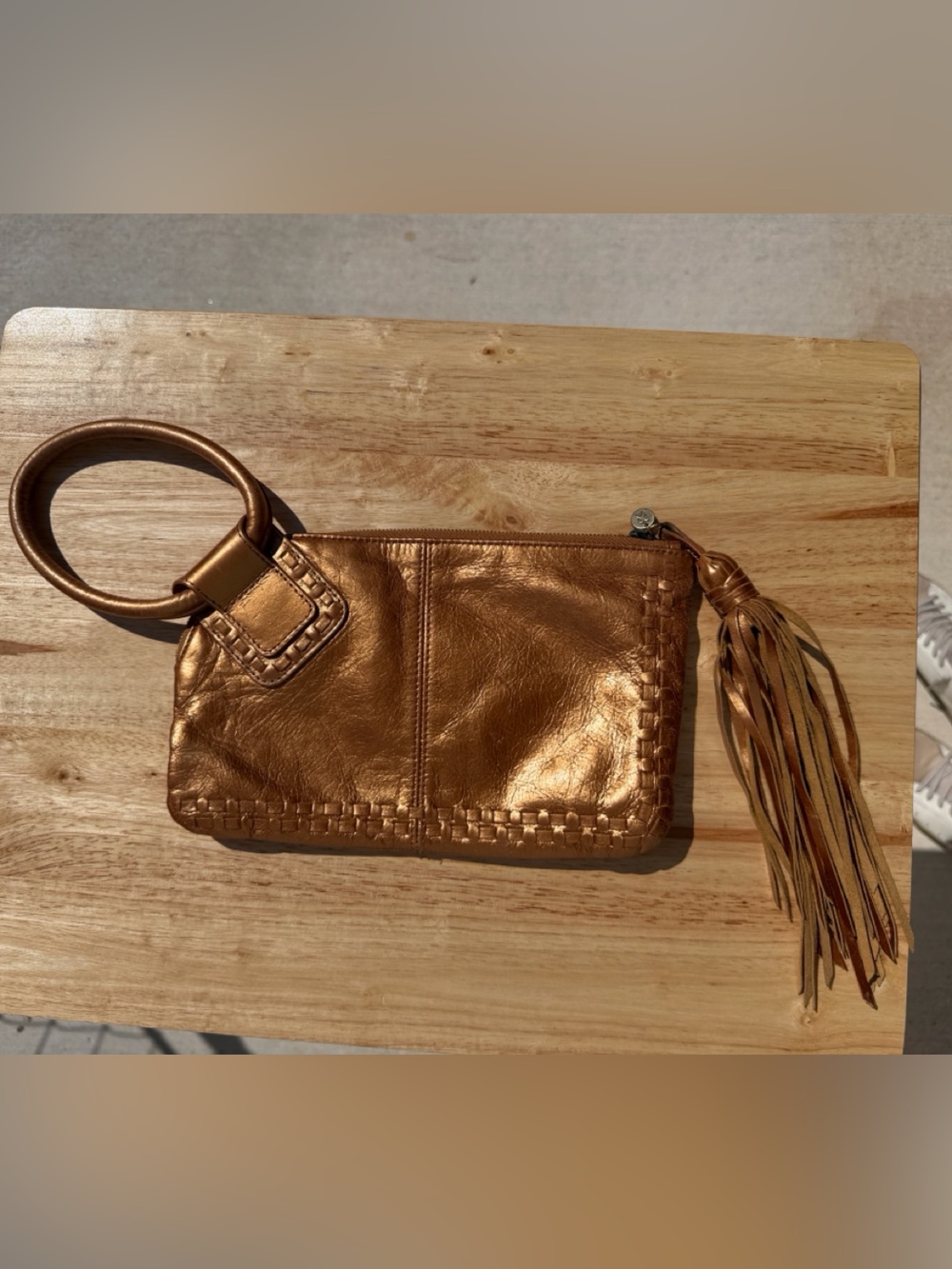 Leather Metallic Copper Wristlet with Tassel Accent